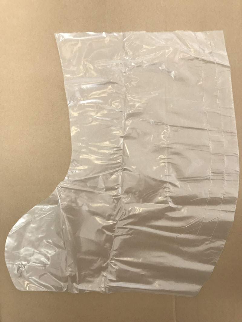DISPOSABLE SELF TIED POLY BOOTS - Disposable plastic boot
